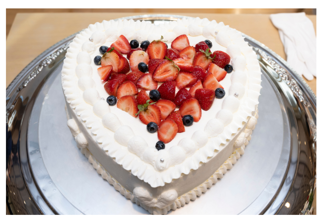 Kitsch heart shape cake with fruit topping