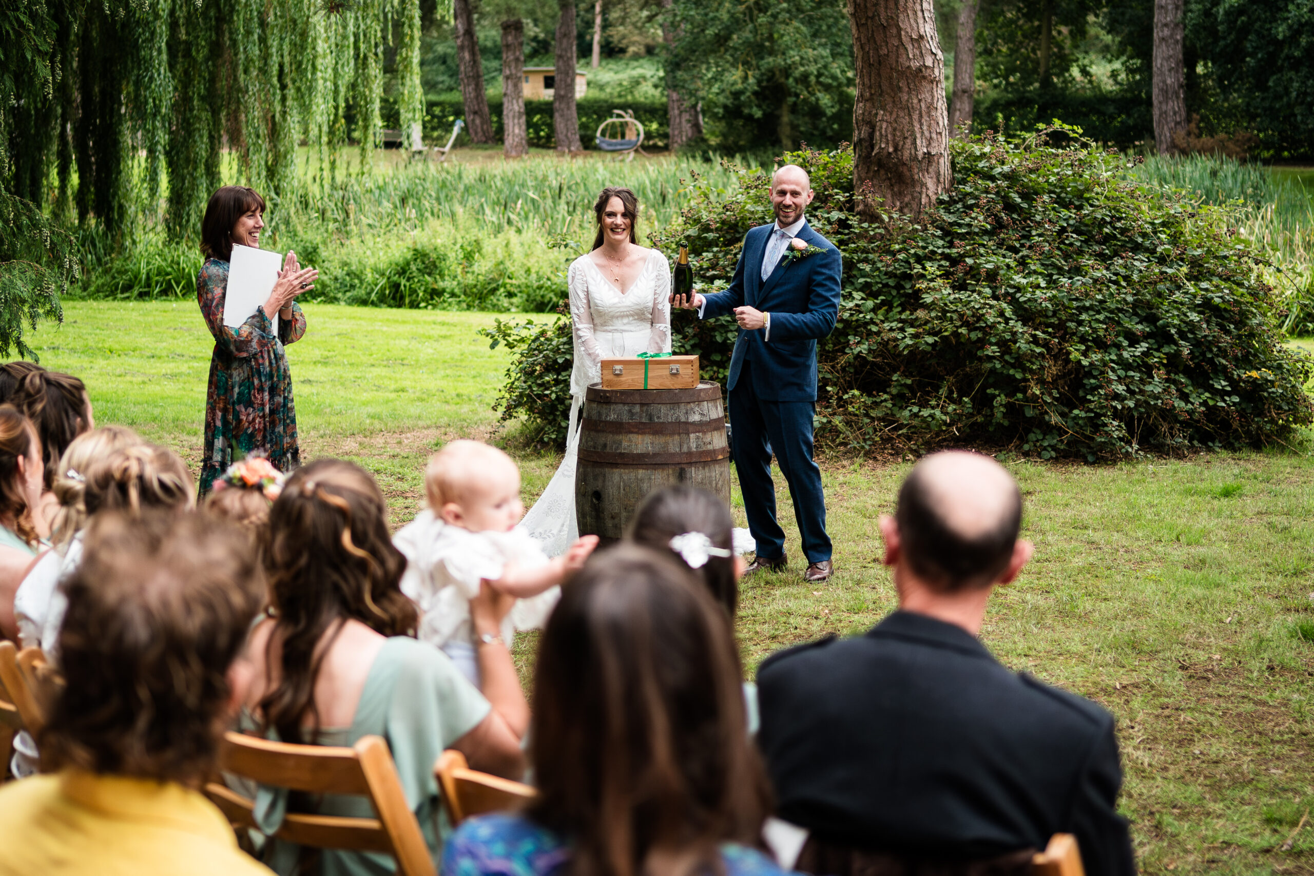 Couple include a Love Letter and Wine Box ritual into their outdoor wedding ceremony www.lisaandneil.co.uk